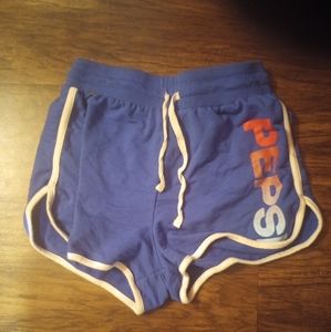 Forever 21 royal blue shorts with rainbow Pepsi print. Size small fits like XS